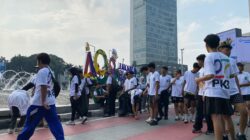 Ratusan Kader PKB Punguti Sampah di Area CFD Jakarta